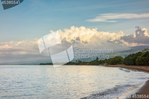 Image of a dark sand beach in northern Bali Indonesia