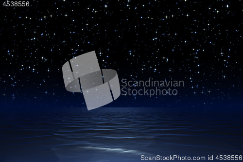 Image of starry night sky at the ocean