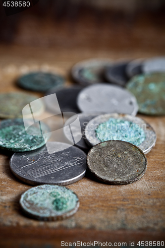 Image of Pile of different ancient copper coins 