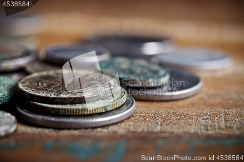 Image of Pile of different ancient copper coins with patina.