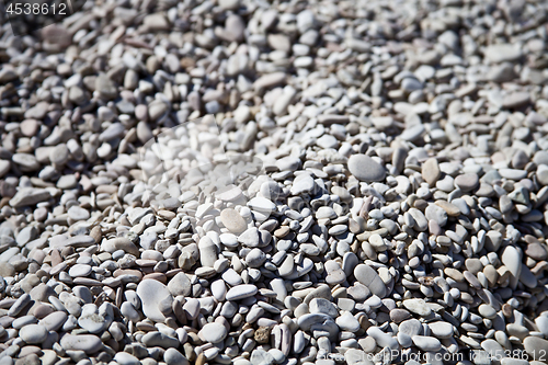 Image of Abstract background with grey and white peable stones 