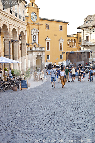 Image of Fermo, Italy - June 23, 2019: People enjoying summer day and foo