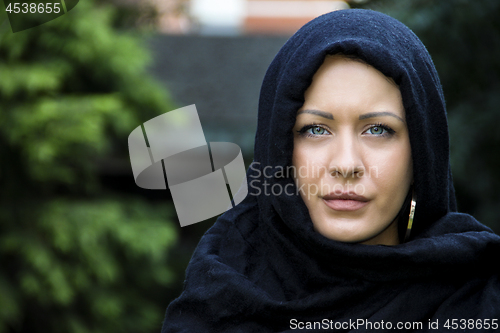 Image of Muslim lady in scarf