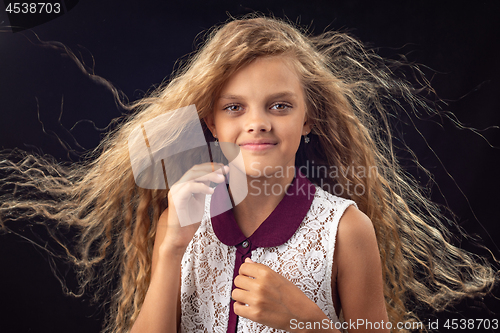 Image of Portrait of a girl with developing hair