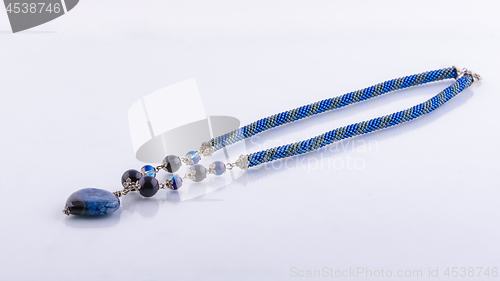 Image of Necklace in blue tones of beads and natural stones