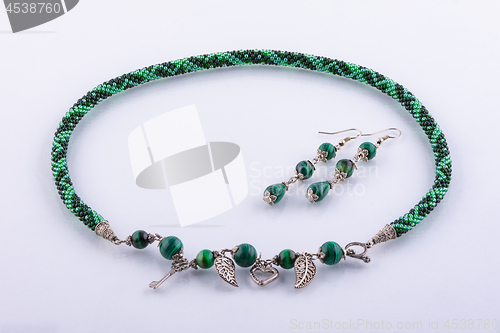 Image of Handmade designer necklace and earrings made of small beads and stones
