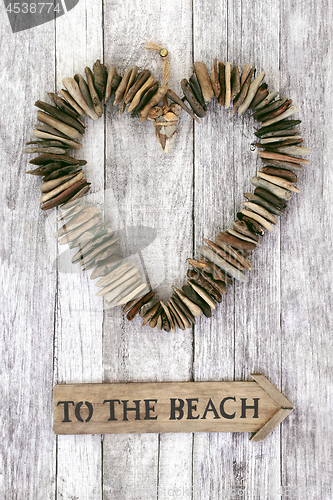 Image of Driftwood Heart and to the Beach Sign