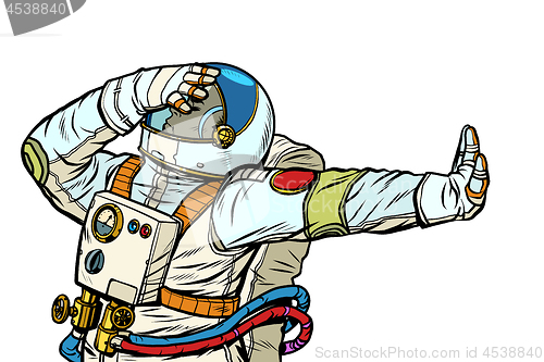 Image of Astronaut in a spacesuit. Gesture of denial, shame, no