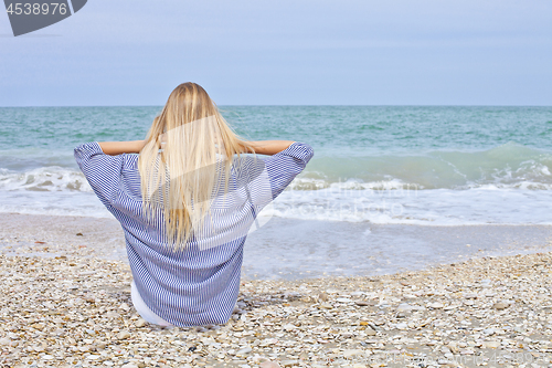 Image of Beautiful girl in sea style on the Adriatic beach. Travel and va