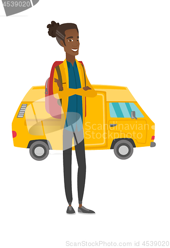 Image of Traveler standing on the background of minibus.