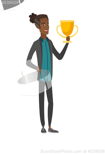 Image of Young african-american man holding a trophy.