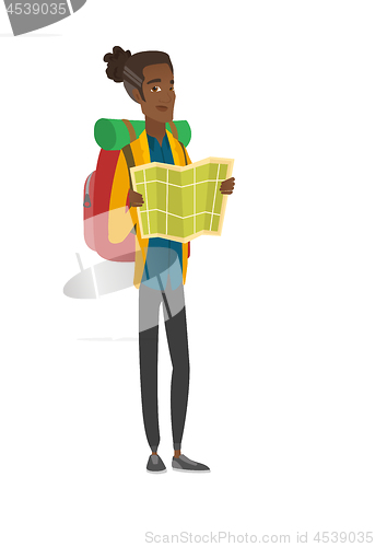 Image of African traveler with backpack looking at map.