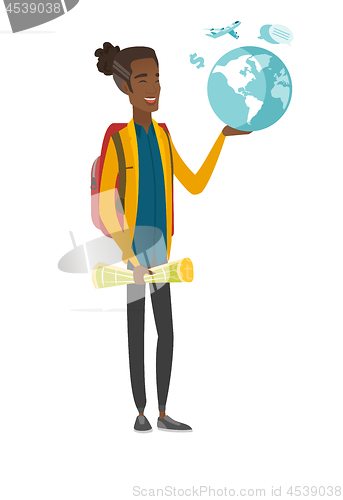 Image of Young african traveler holding map and globe.