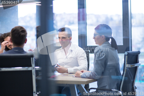 Image of Startup Business Team At A Meeting at modern office building