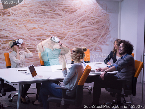 Image of startup business team using virtual reality headset