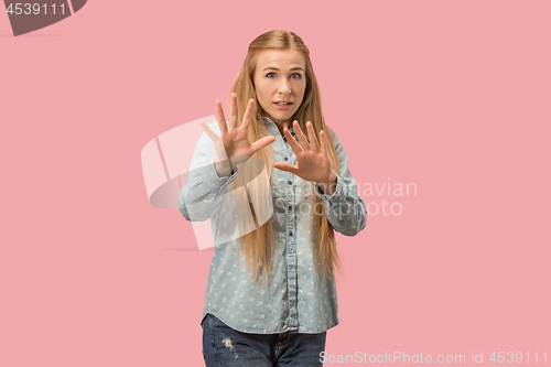 Image of Let me think. Doubtful pensive woman with thoughtful expression making choice against pink background