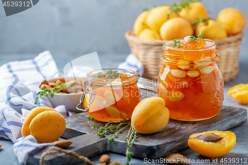 Image of Apricot jam with thyme and almonds.