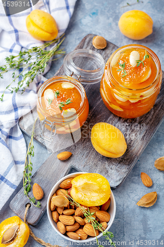 Image of Delicious apricot jam with thyme and almonds.