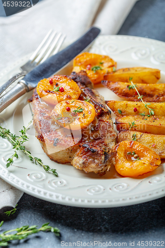 Image of Entrecote of pork with apricots and thyme.