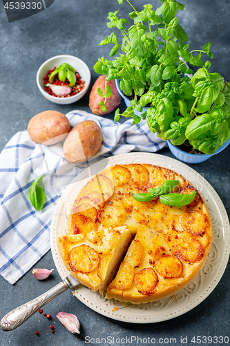 Image of Sliced traditional potato pie.