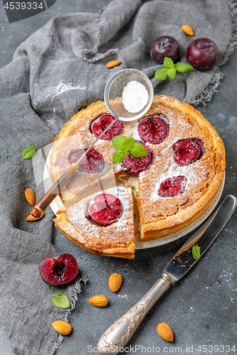 Image of Homemade plum cake with almond frangipane.