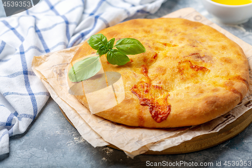 Image of Traditional Georgian closed pie with cheese.