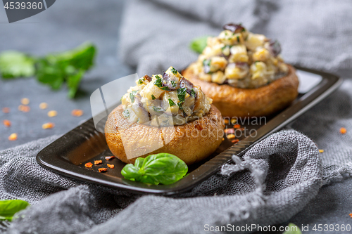 Image of Baked mushrooms with minced eggplant and mushrooms.