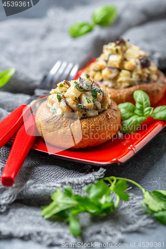 Image of Baked mushrooms with vegetable stuffing.