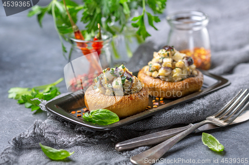 Image of Stuffed mushrooms with eggplant and herbs.