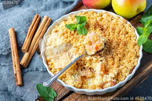 Image of Apple crumble with cinnamon for breakfast.