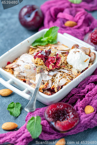 Image of Delicious plum crumb with yogurt for Breakfast.