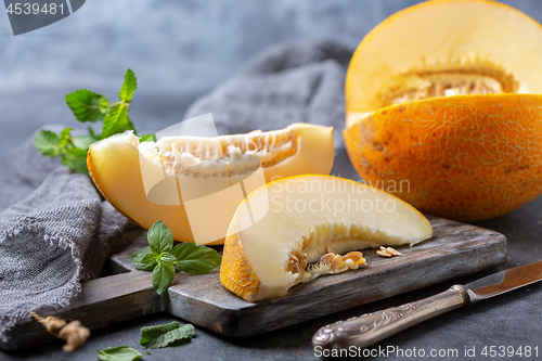 Image of Ripe melon chopped into pieces.