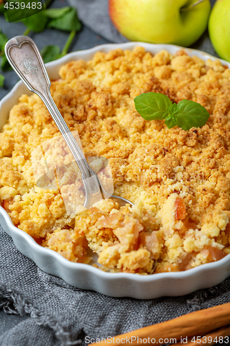 Image of Apple crumble and a dessert spoon closeup.