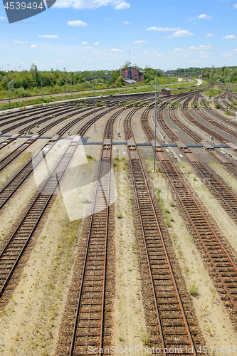 Image of Empty freight railway yard with many tracks and operations contr