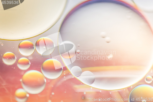 Image of Defocused pastel colored abstract background picture made with oil, water and soap