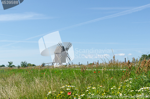 Image of Traditional windmill, the symbol of the island of sun and wind O