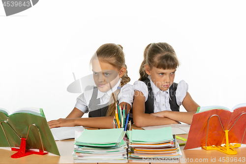 Image of Two quarreling girls at the same desk