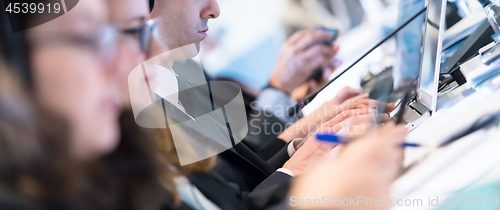 Image of close up of business people hands using laptop computer