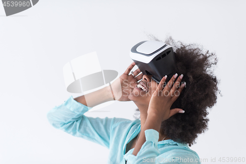 Image of black girl using VR headset glasses of virtual reality