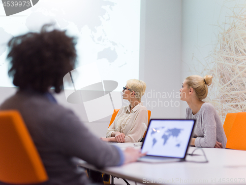 Image of Startup Business Team At A Meeting at modern night office buildi