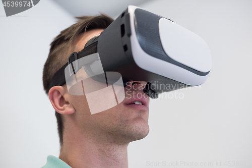 Image of man using VR-headset glasses of virtual reality