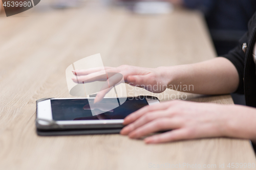 Image of Businesswoman using tablet