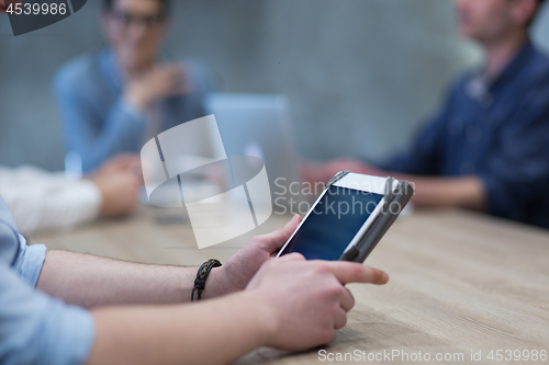 Image of businessman using tablet computer