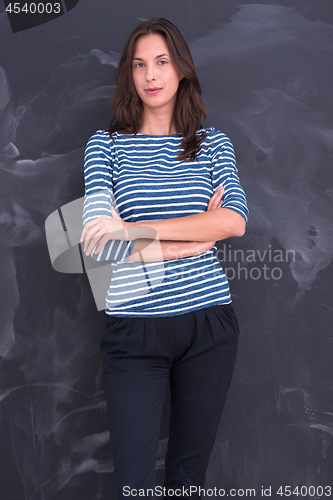 Image of woman standing in front of chalk drawing board