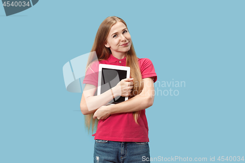 Image of The happy businesswoman with red laptop on blue