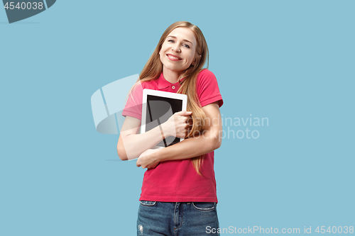 Image of The happy businesswoman with red laptop on blue