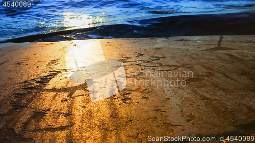 Image of Prehistoric Petroglyphs In The Sunset Light