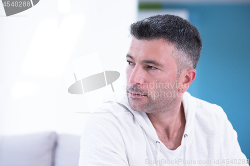 Image of Portrait of a young man at home