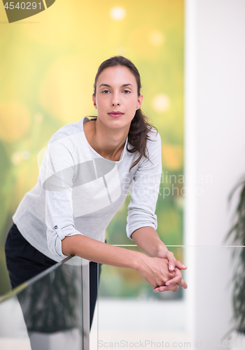 Image of portrait of a young beautiful woman at home