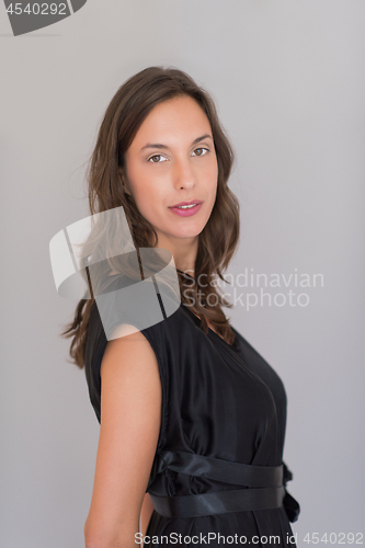 Image of woman in a black dress isolated on white background